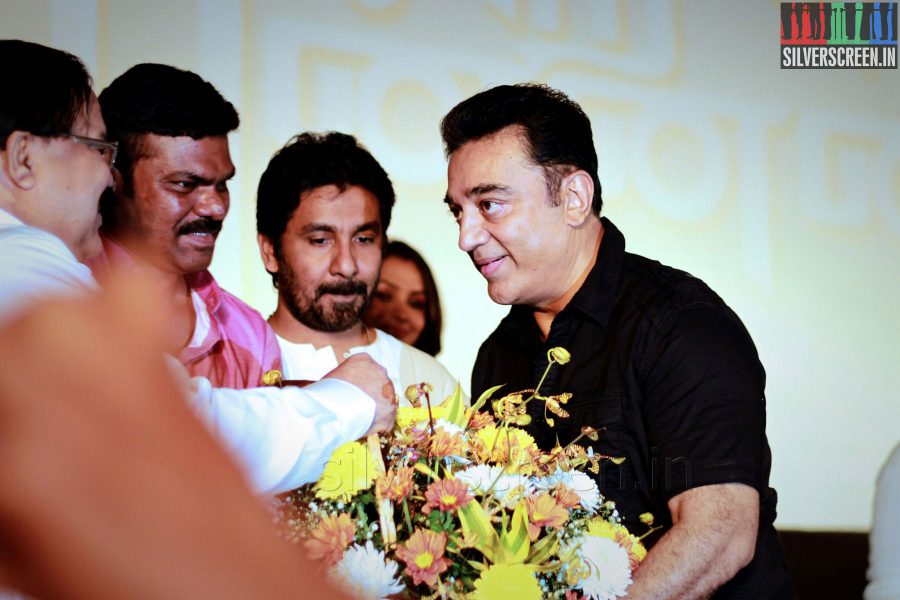 Producers Dr V Ramadoss, GKM Tamil Kumaran and Kamal Haasan at the Punnagai Audio Launch
