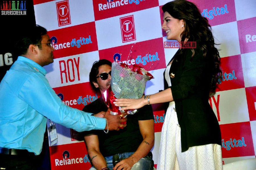 Actress Jacqueline Fernandez and Arjun Rampal promote film Roy at Reliance Digital