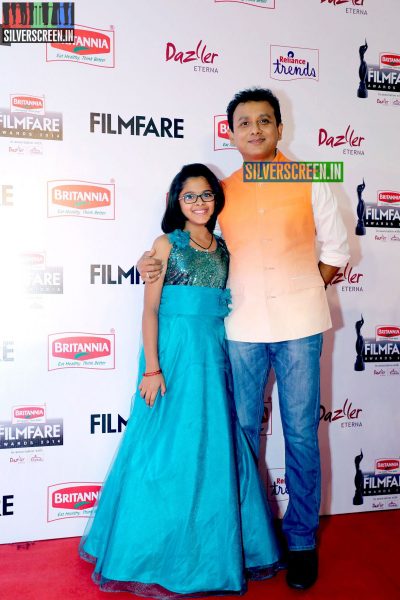 Unni Krishnan and Uthra Unnikrishnan at the 62nd Filmfare Awards South Photos