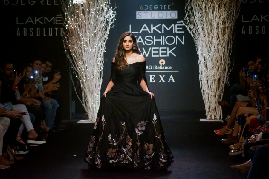 Mumbai: Actress Ileana D'Cruz displays the creation of fashion d