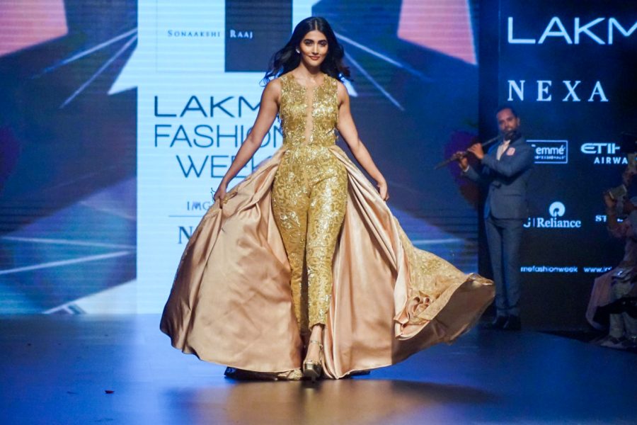 Mumbai: Actress Pooja Hegde displays the creation of fashion des
