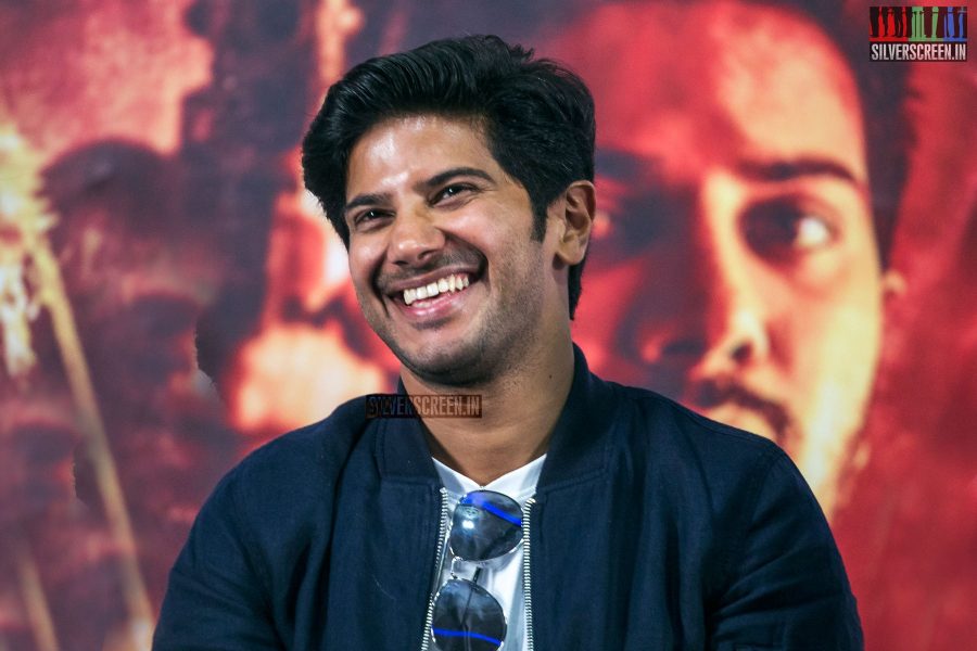 With Dulquer Salmaan playing four different characters in 'Solo', we aren't quite sure which character he is trying to emulate. Nevertheless, he appears to be having at the film's press meet in Chennai.